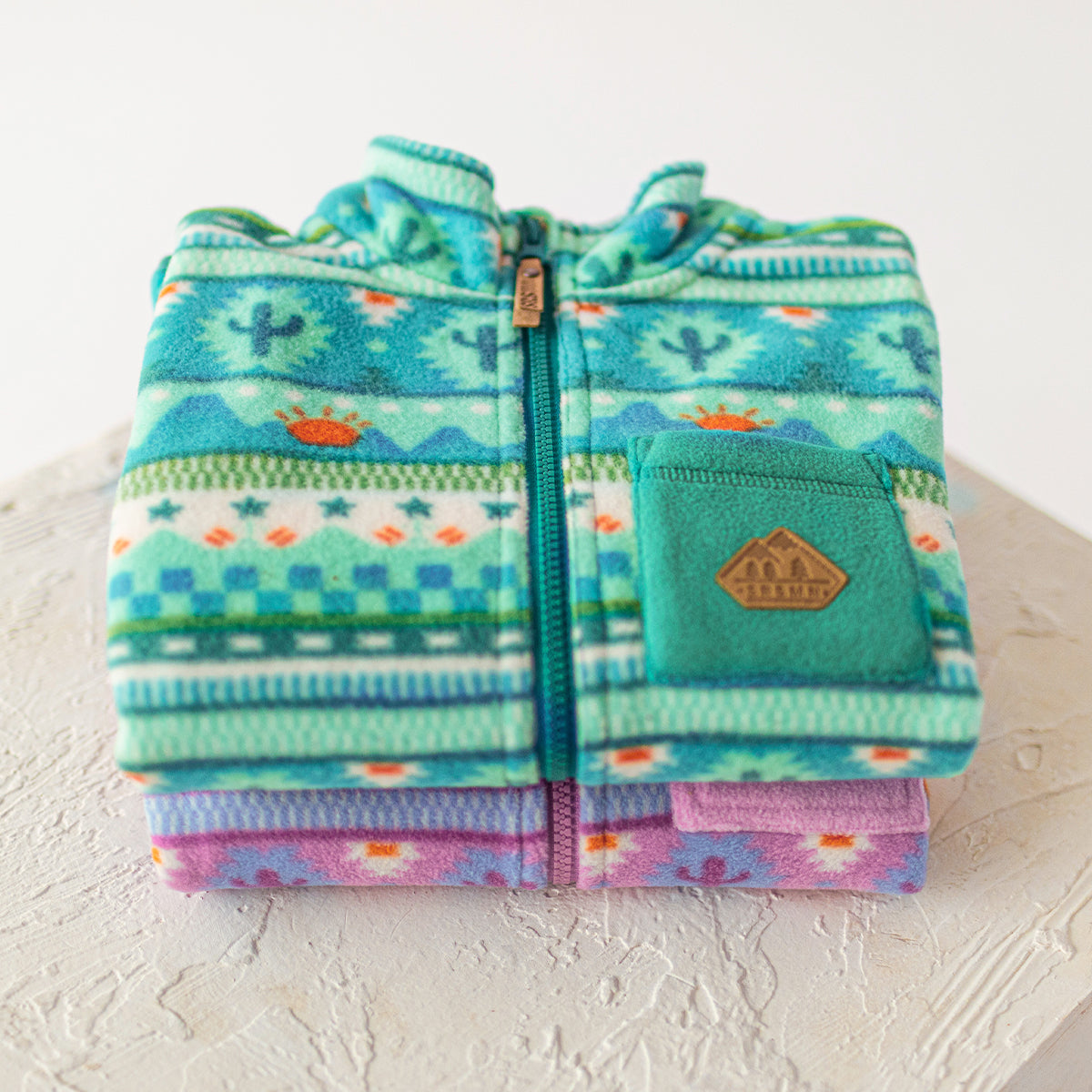 Souris Mini - Turquoise patterned fleece jacket