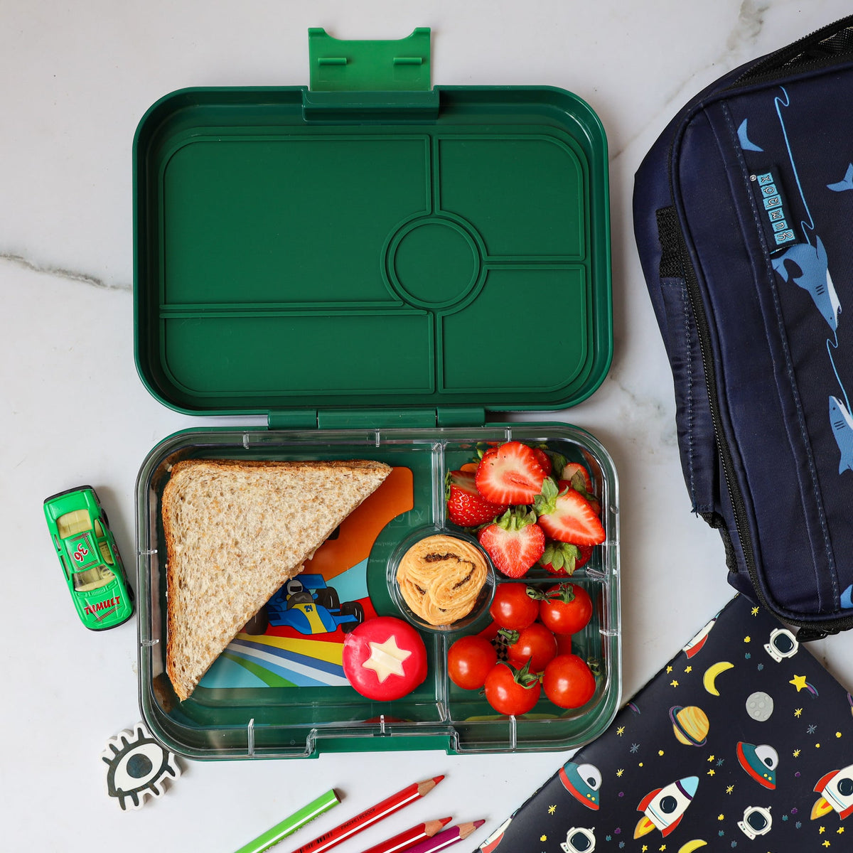 Green lunchbox with Food