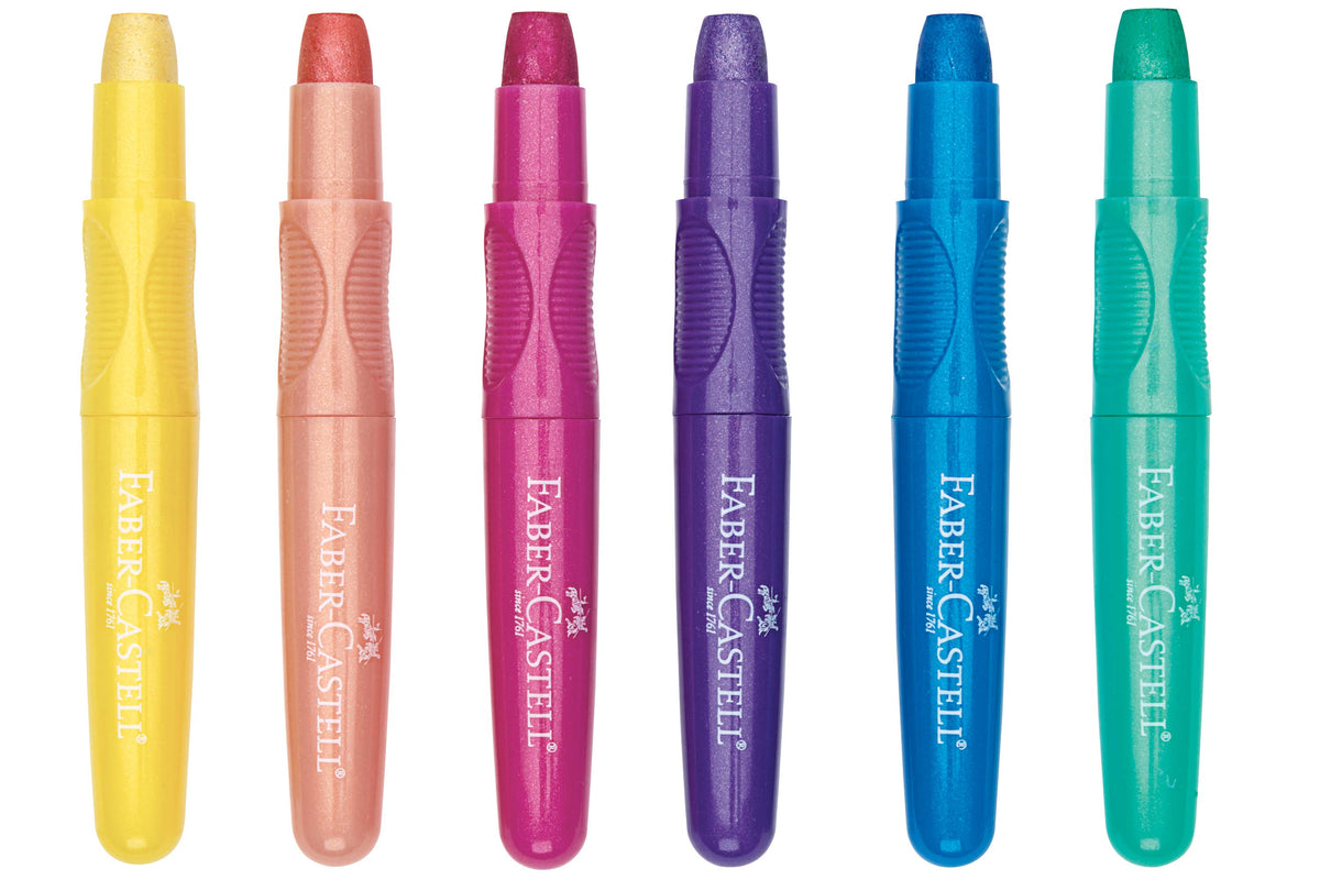 Set of six Faber-Castell crayons in different colors on a white background