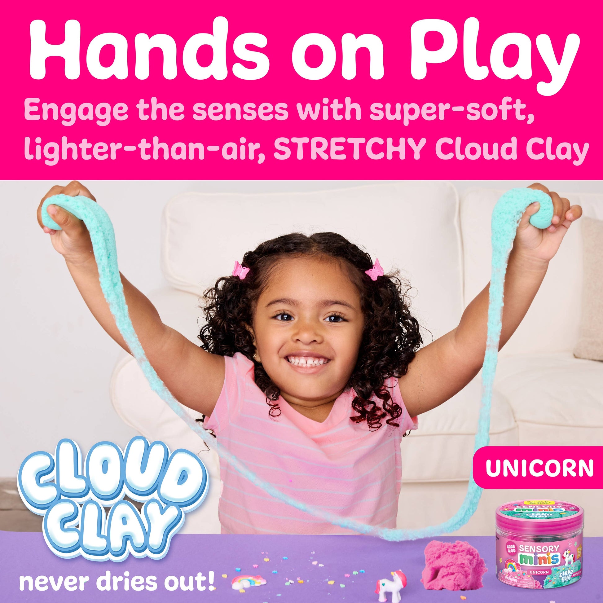 Child playing with Cloud Clay stretchy toy on a pink background