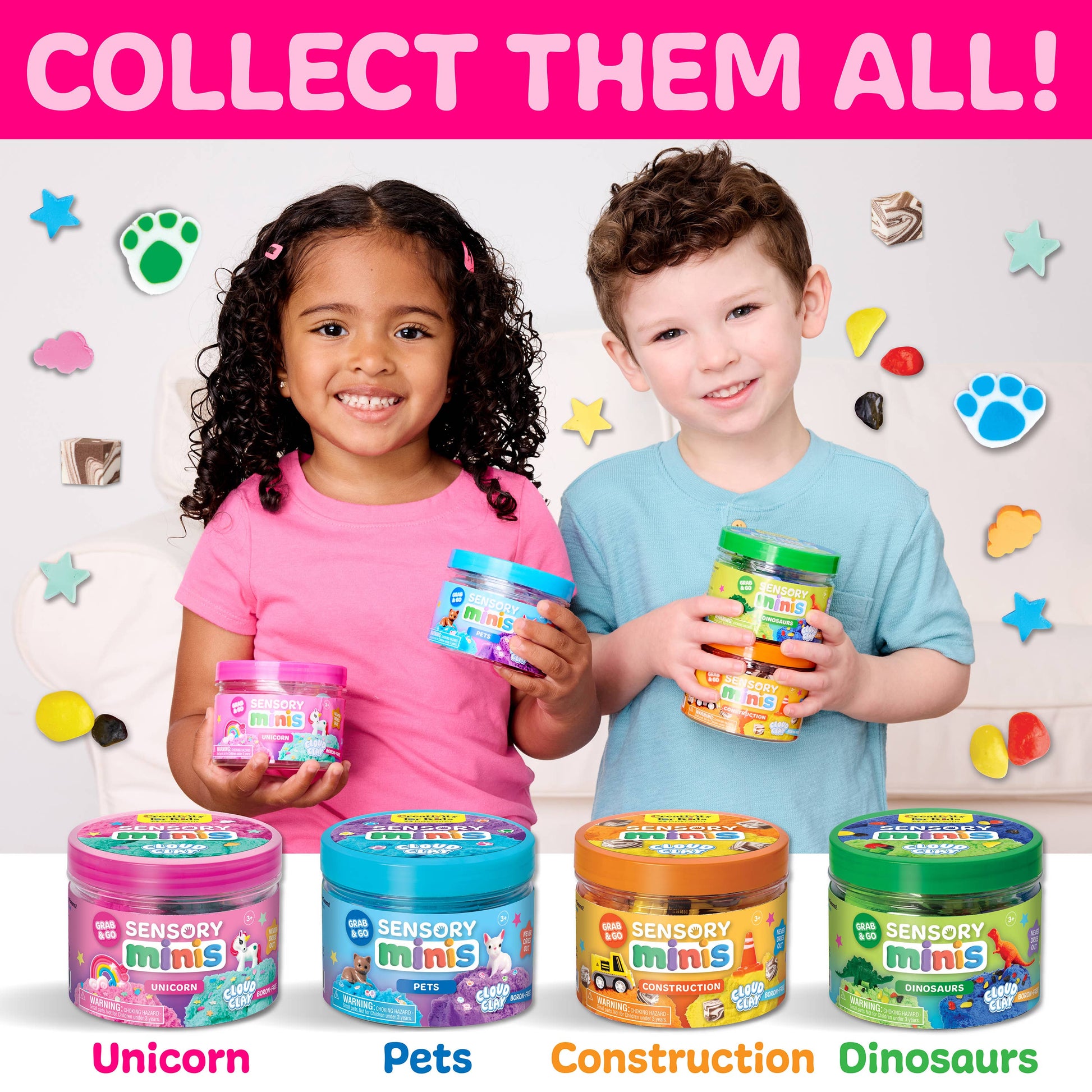 Two children holding sensory mini containers with colorful lids, surrounded by more containers on a white background. 1