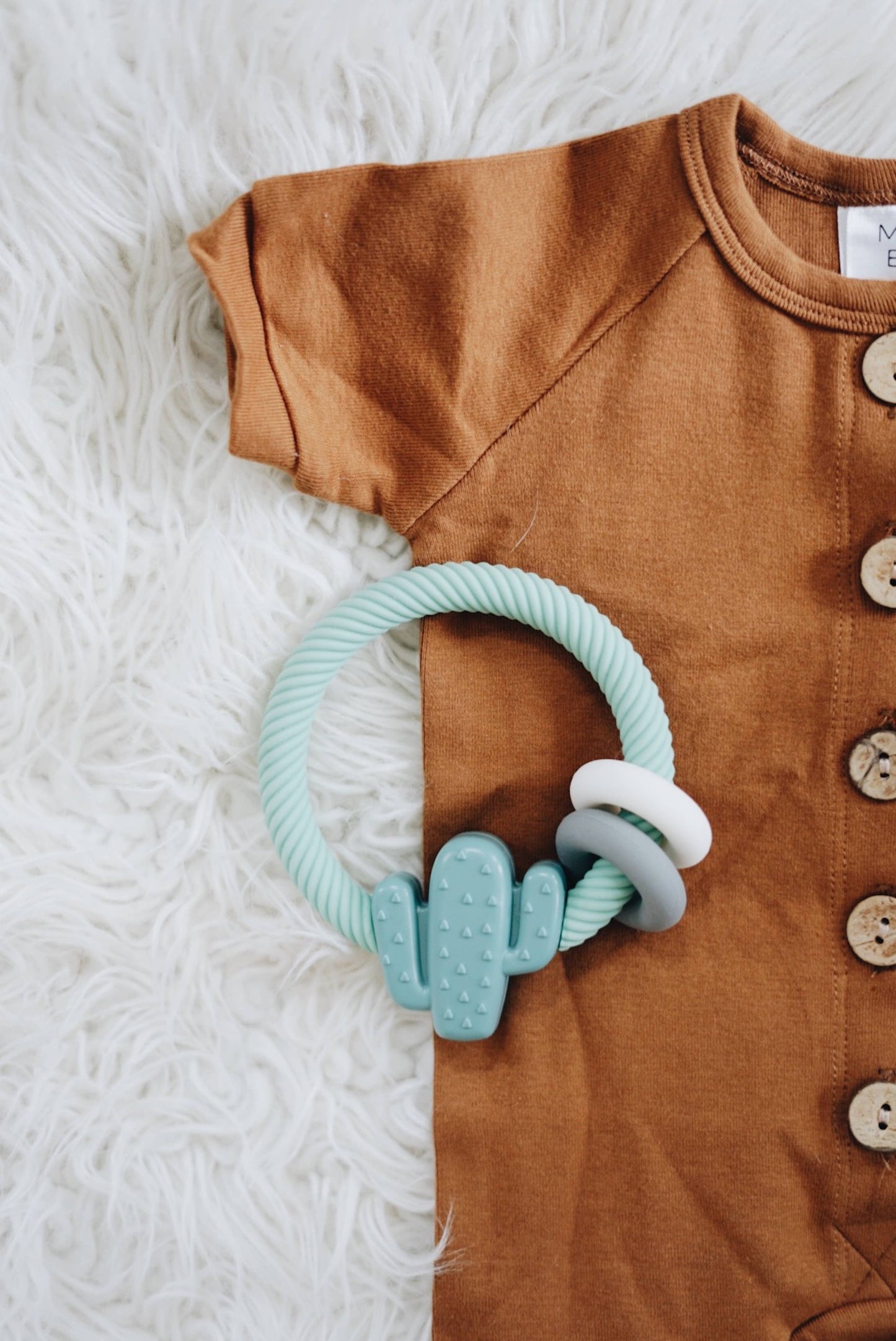 Itzy Ritzy -  Ritzy Rattle™ Silicone Teether Rattles: Highland Cow