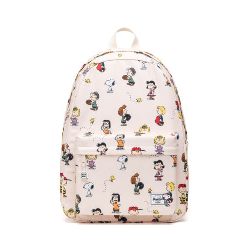 A light pink backpack featuring an all-over cartoon print of Peanuts characters including Snoopy, Woodstock, Charlie Brown, and Lucy, set against a plain white background.